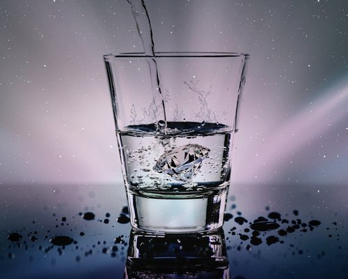A clean glass of fresh drinking water keeping the body active