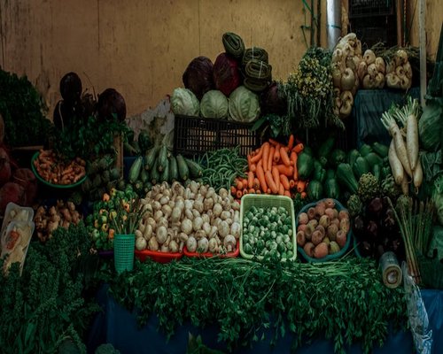 Vibrant display of organic vegetables at a local traditional market